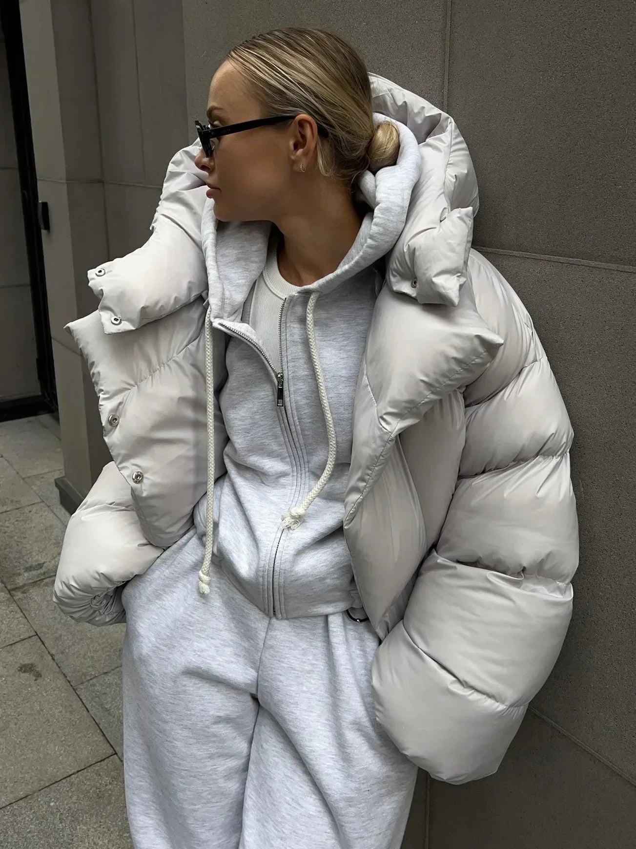 Women's oversized puffer jacket cozy hooded winter coat with padded insulation for effortless layering