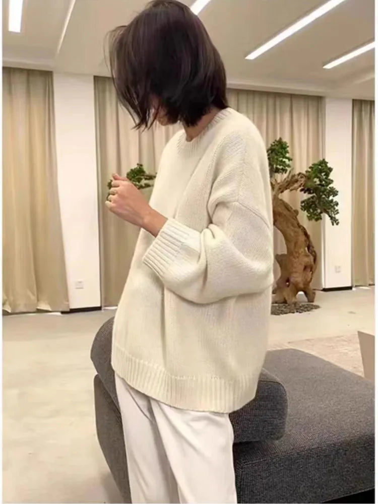 Women's merino wool mid-length knit sweater, elegant soft comfort for autumn and winter