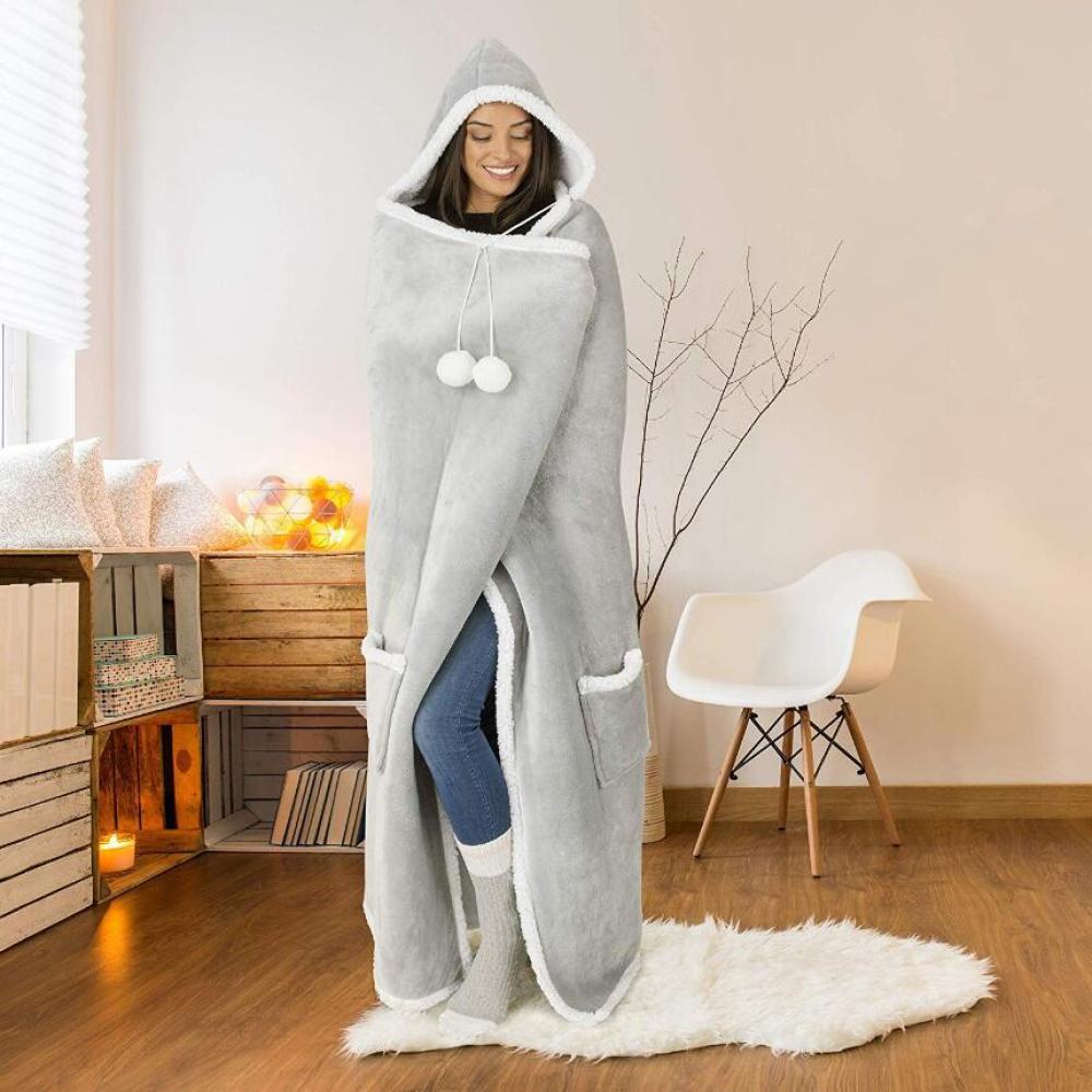 Fluffy gray hoodie blanket with foot pockets, cozy oversized wearable wrap for cold days