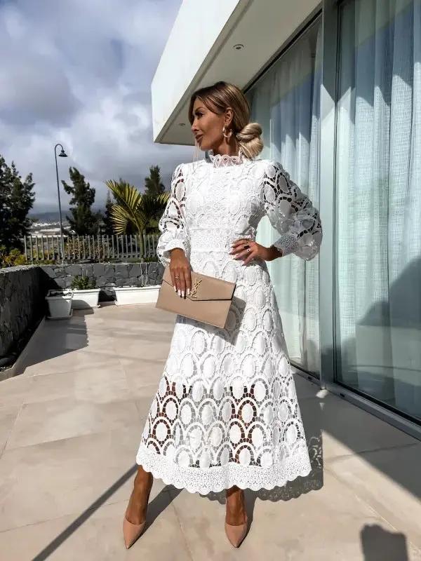 White lace women's dress with high neckline, puff sleeves, lightweight airy fabric for elegant summer style