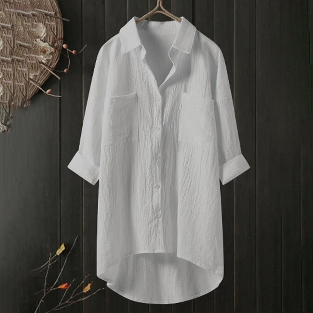 White women's classic long-sleeve blouse, solid color premium cotton blend, polished work-ready silhouette
