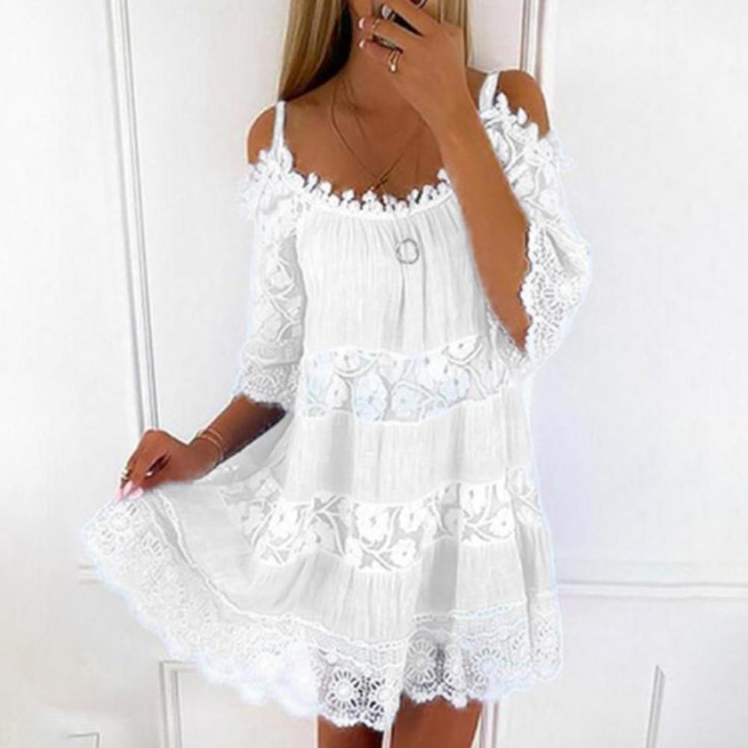Women's off-shoulder mini dress in flowy silhouette with delicate lace panels, lightweight summer style