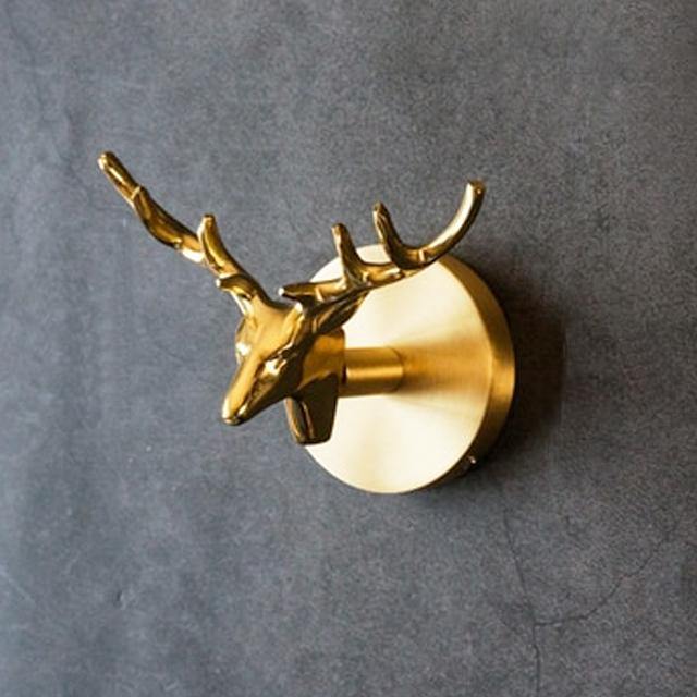 Brass bird-shaped coat hook gold-tone wall organizer with sculptural elegance for entryways