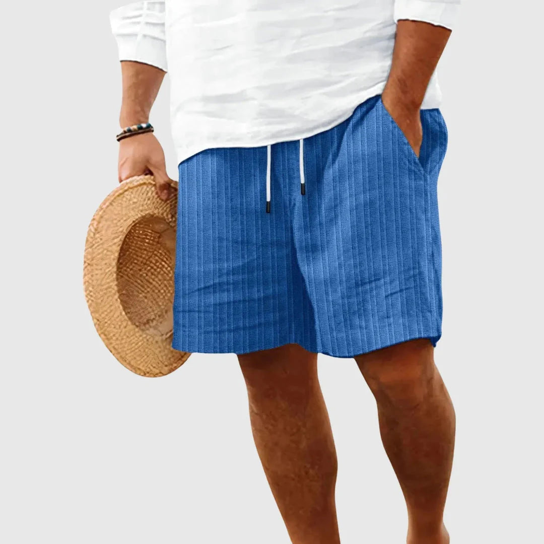 Women's striped relaxed-fit shorts in neutral tones with drawstring waist for beach vacation