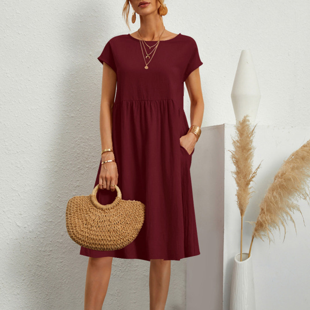 Women's A-line midi dress in versatile solid color, flattering mid-calf length for everyday style