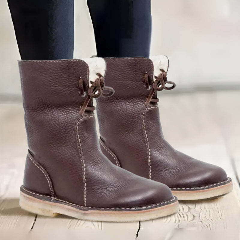 Women's warm winter boots with cushioned interior, supportive structure, and plush lining for all-day comfort