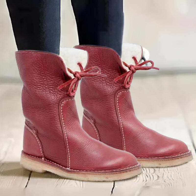 Women's warm winter boots with cushioned interior, supportive structure, and cozy plush lining