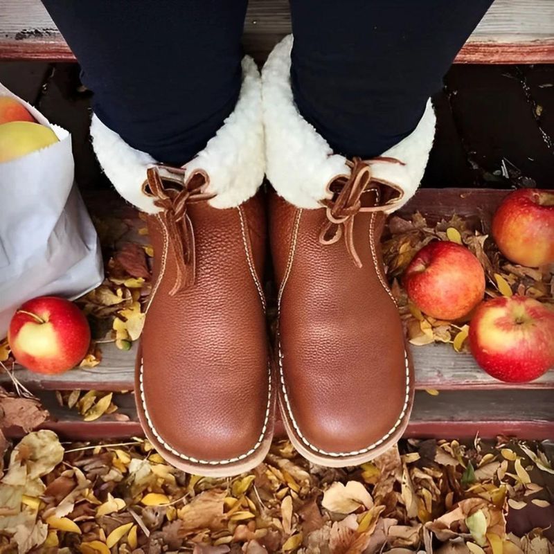 Women's warm winter boots with plush cushioned interior, supportive structure, and all-day comfort design