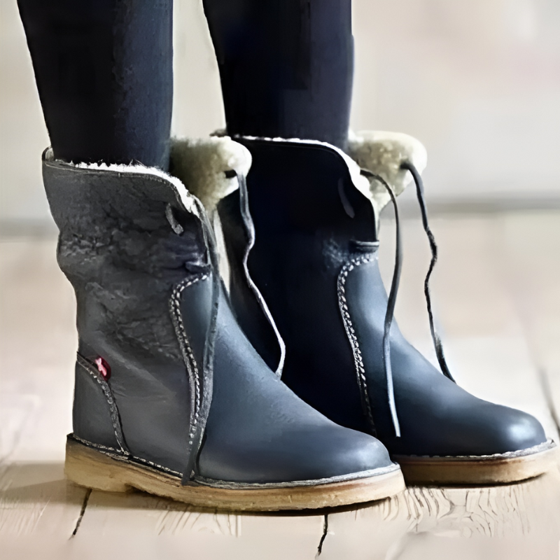 Women's warm winter boots with cushioned plush lining, supportive structure, and all-day comfort design
