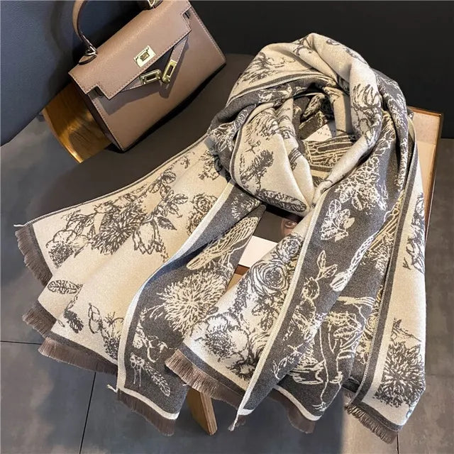 Luxurious pashmina blanket scarf in soft neutral tones, oversized cozy wrap with elegant drape