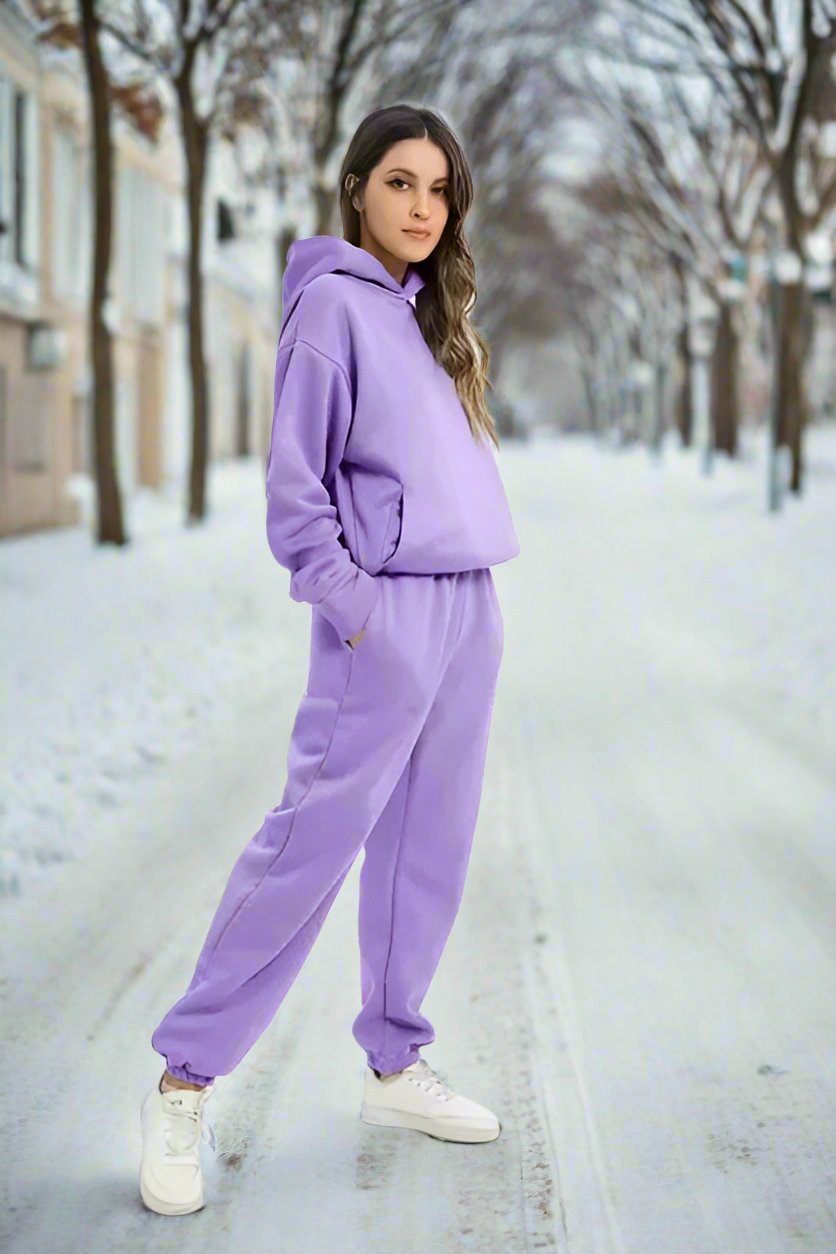 Women's casual lounge two-piece matching set in soft spring tones, relaxed fit for travel comfort