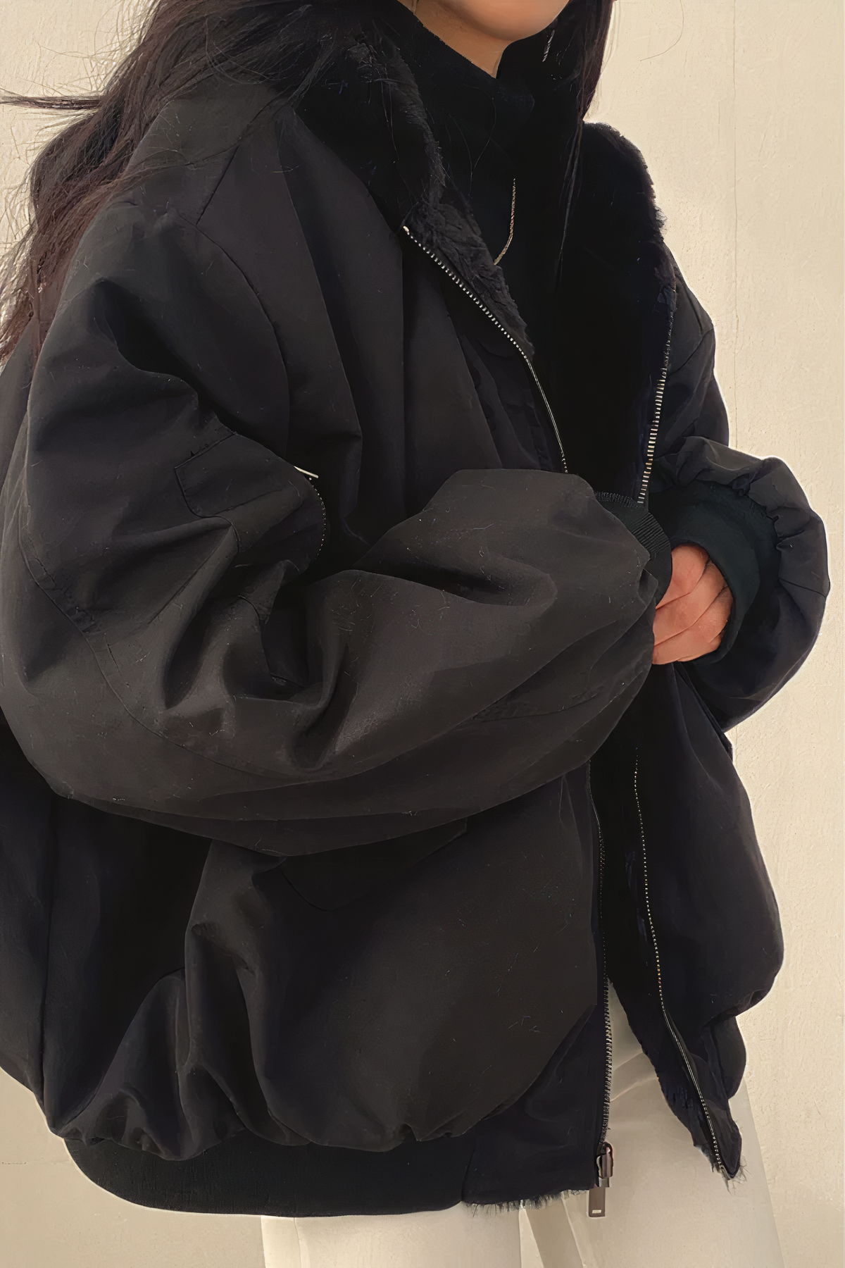 Women's oversized quilted winter coat with hood, sheepskin-lined, bold urban silhouette