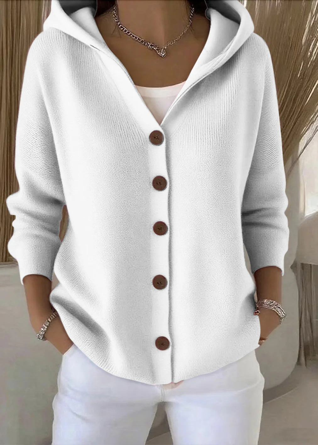 Women's hooded knit cardigan button-front minimalist silhouette with wooden buttons effortless layering