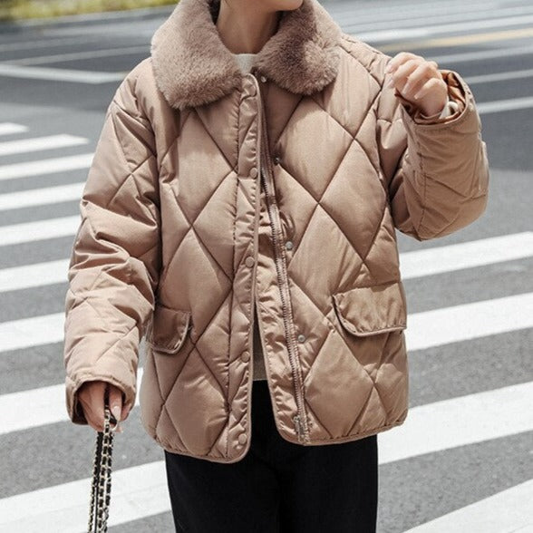 Women's black quilted windproof jacket, cozy hip-length sporty feminine fit with warm insulation
