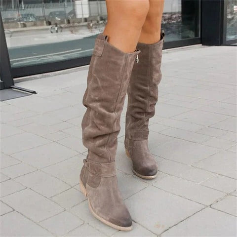 Women's mid calf pull-on winter boots in neutral tone with structured supportive upper for cold weather