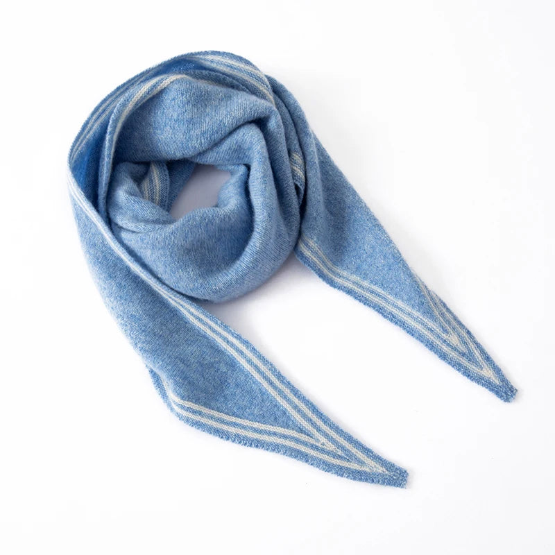 Women's beige cashmere knit scarf with contrast stripe trim, elongated slim profile for wrapping