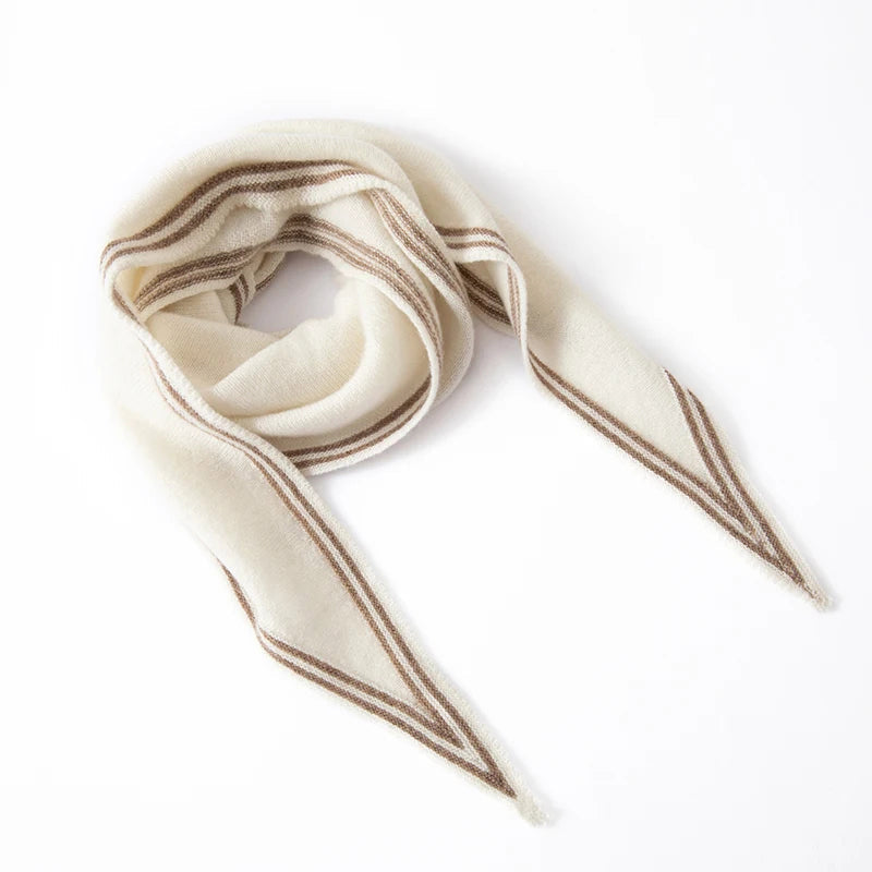 Women's beige cashmere knit scarf with contrast stripe trim and elongated slim silhouette