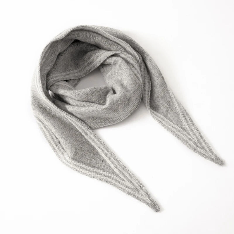 Beige cashmere knit women's scarf with contrast stripe trim and elongated slim wrappable profile