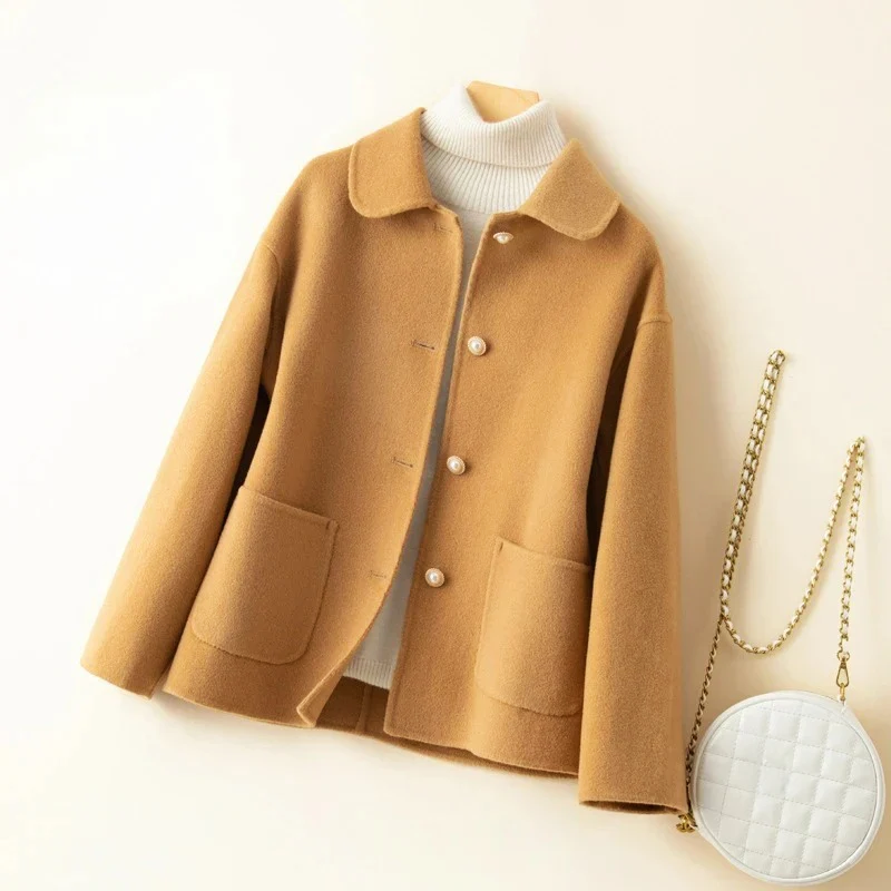 Women's hip-length double-sided wool coat with elegant rounded collar in classic fall style