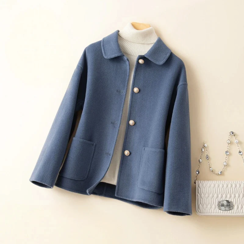 Women's hip-length double-sided wool coat with elegant rounded collar in classic fall style