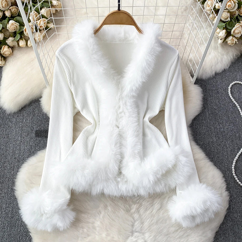 Women's ribbed top with faux fur trim V-neck hip-length elegant evening wear luxe silhouette