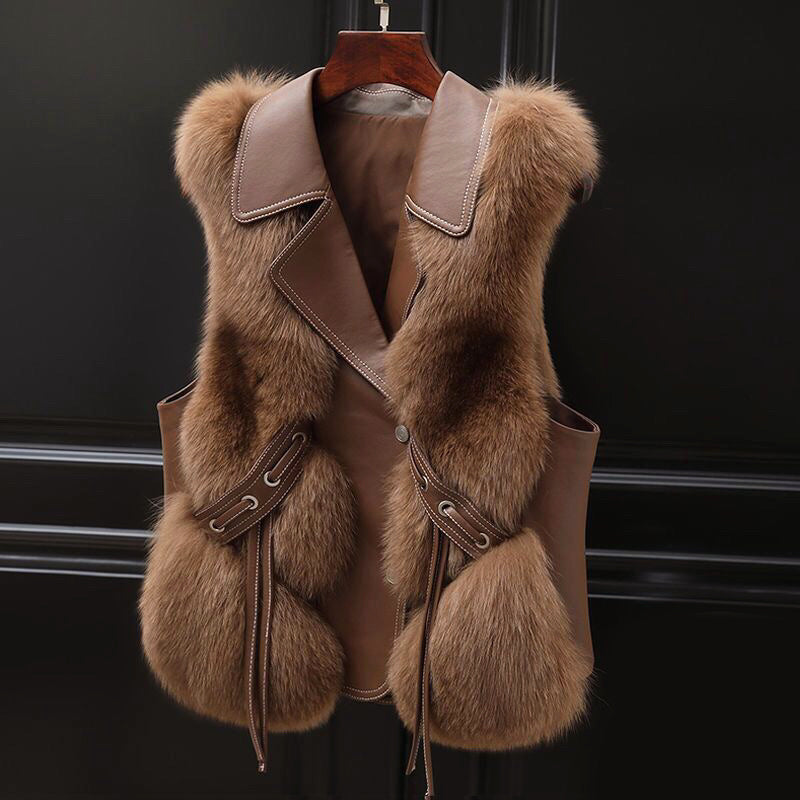 Women's cream faux fur vest with wide lapel collar, waist tie, and fluffy hip-length silhouette