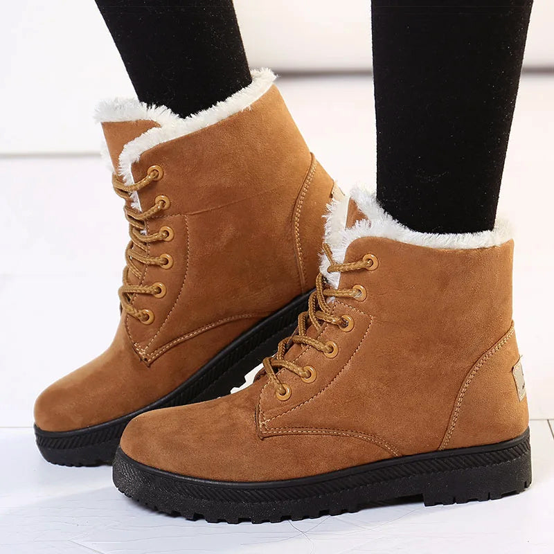 Women's lace-up ankle boots in PU suede with faux fur lining and textured traction outsole
