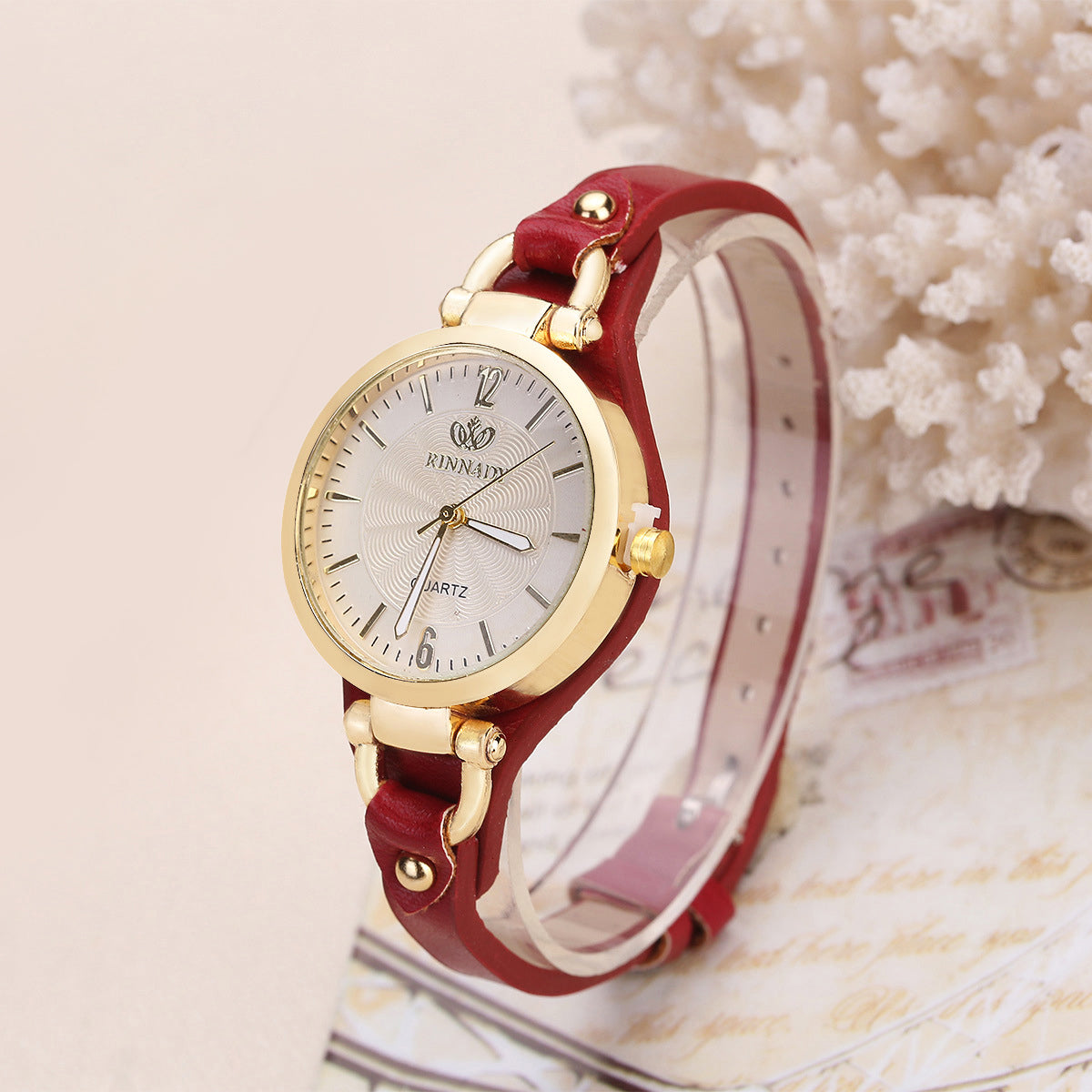 Isla faux leather wristwatch adjustable strap gold-tone bezel round dial women everyday elegance