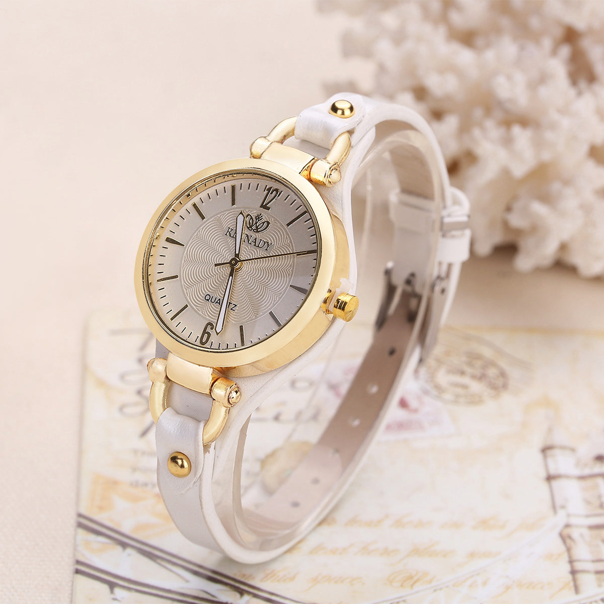 Isla faux leather wristwatch adjustable strap gold-tone bezel round dial women everyday elegance