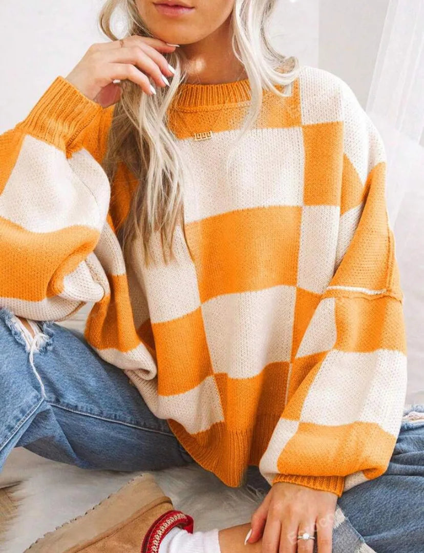 Women's oversized checkerboard knit sweater two-tone block pattern cozy relaxed silhouette for layering