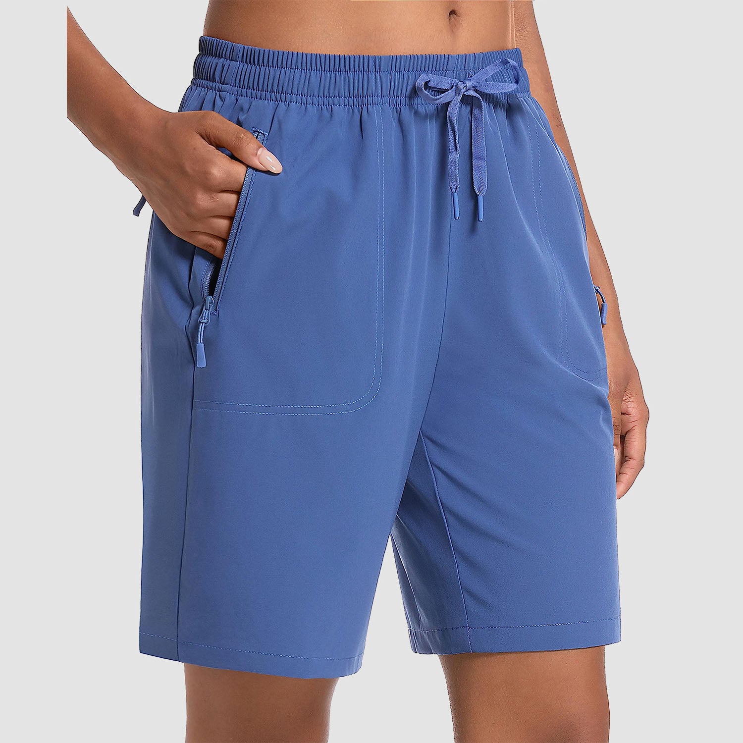Women's lightweight quick-dry hiking shorts, breathable water-resistant with 3 zip pockets for outdoor adventures