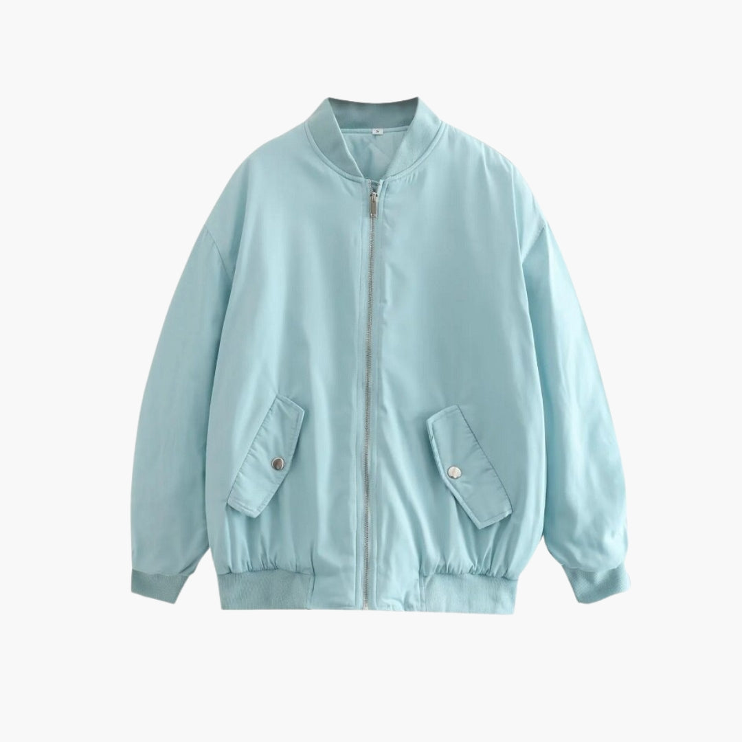 Oversized women's bomber jacket, ribbed neckline, full-zip closure, flap pockets, cozy autumn winter style