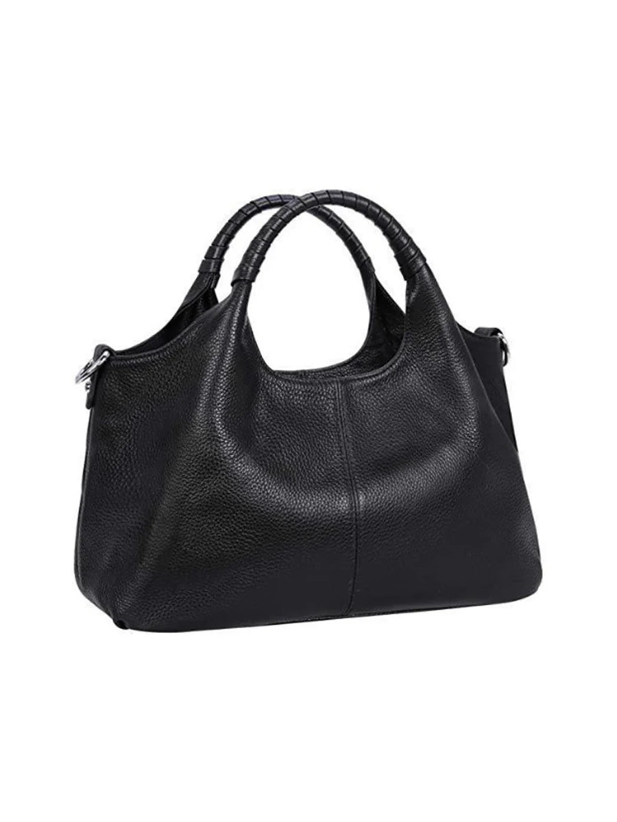 Women's black PU leather luxury handbag with spacious interior and secure zipper closure