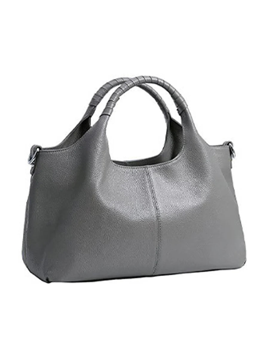 Women's black PU leather luxury handbag with spacious interior and secure zipper closure