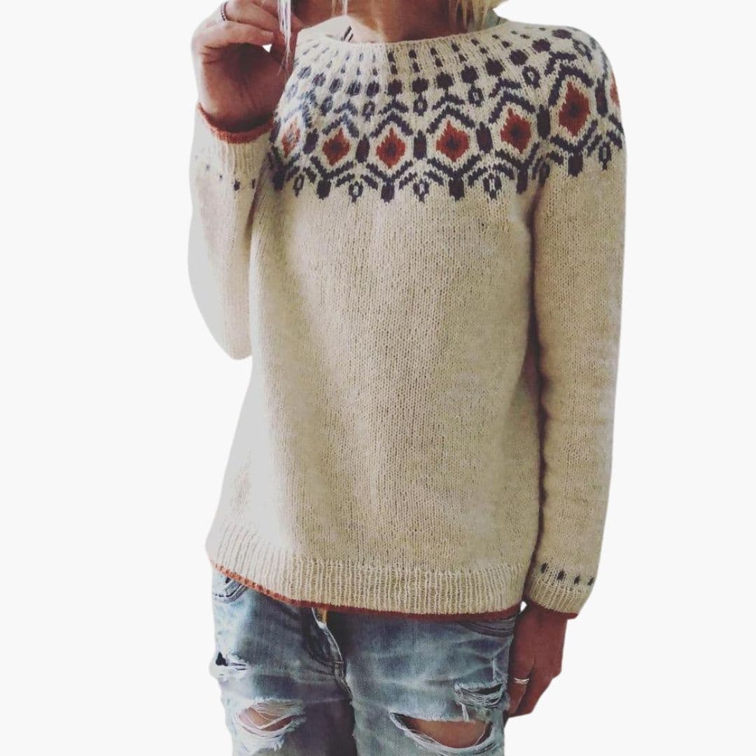 Women's cozy round-neck knit sweater with geometric yoke pattern, ribbed hem, and long sleeves