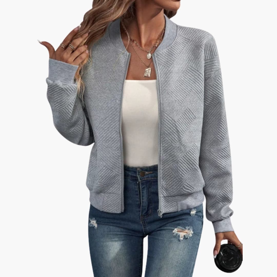 Women's transitional bomber jacket with full zipper, ribbed detailing, versatile layering for all seasons