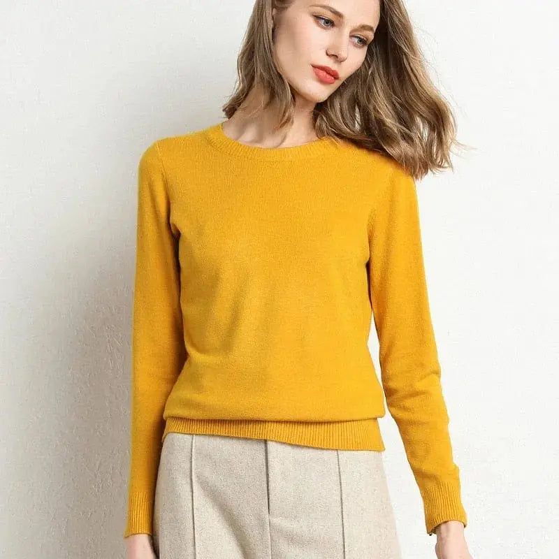 Women's soft cashmere crew neck sweater with ribbed trim, classic luxurious fit in neutral tone