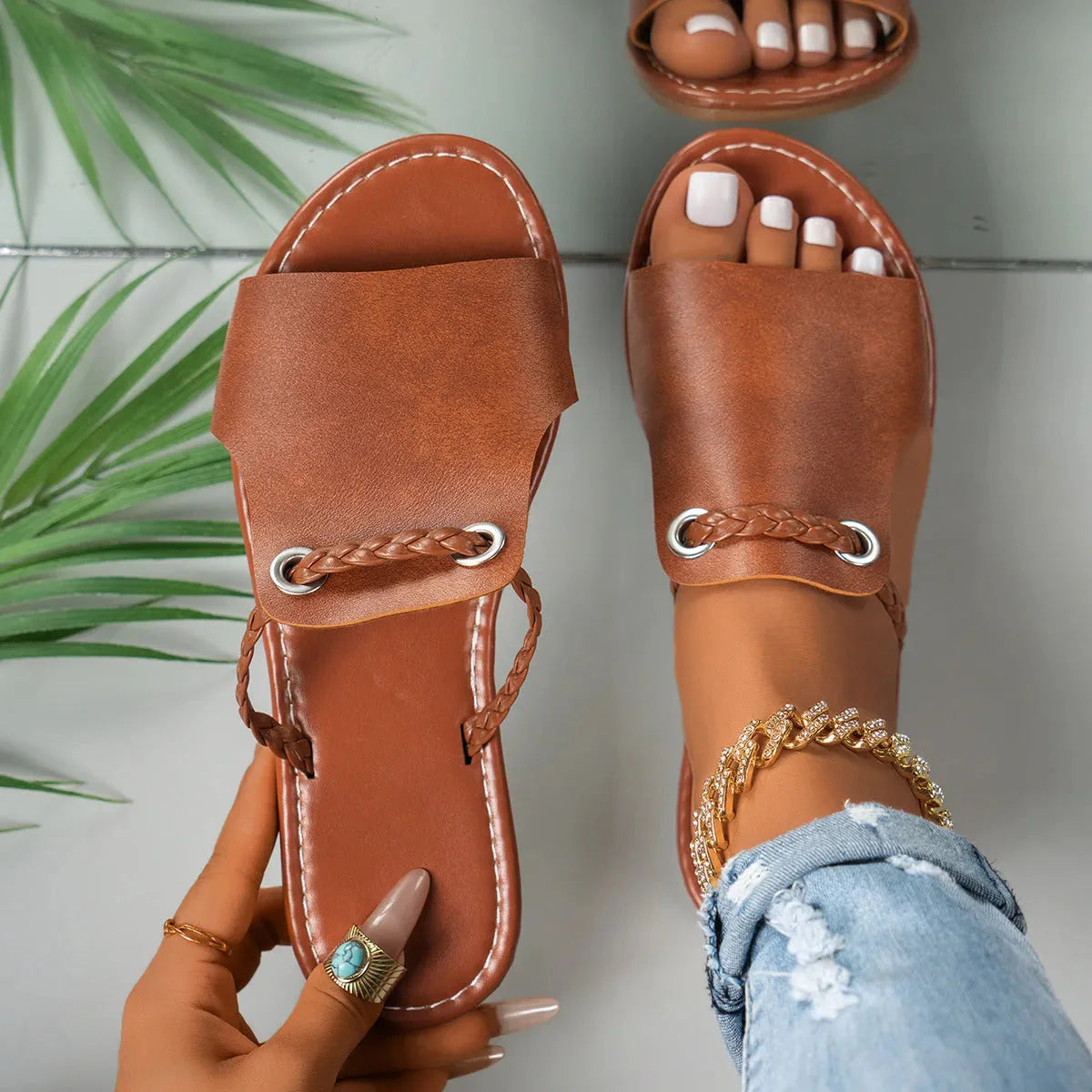 Women's slip-on sandals with braided faux leather strap, metallic grommet accents, summer casual style