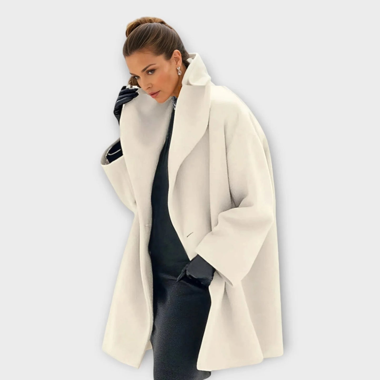 Women's knee-length oversized wool coat with wide lapels, luxurious warmth for workwear and cold weather