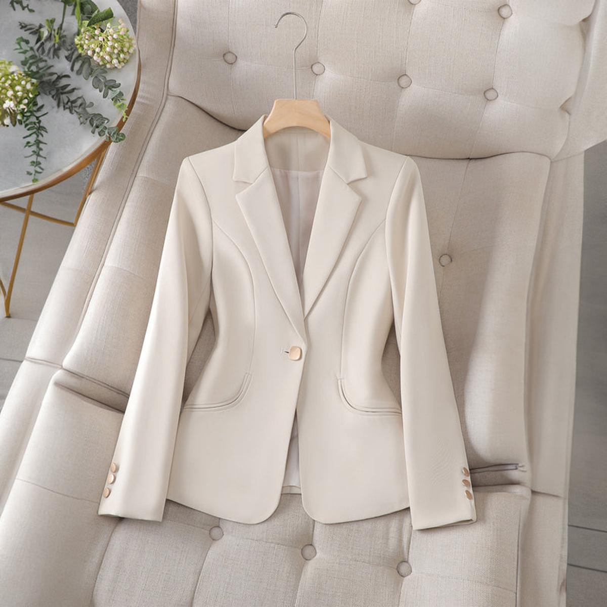 Women's slim fit blazer with lapel collar, single button closure, soft structured silhouette