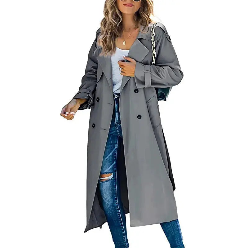 Women's long double-breasted trench coat with adjustable waist belt, classic lapels, timeless silhouette