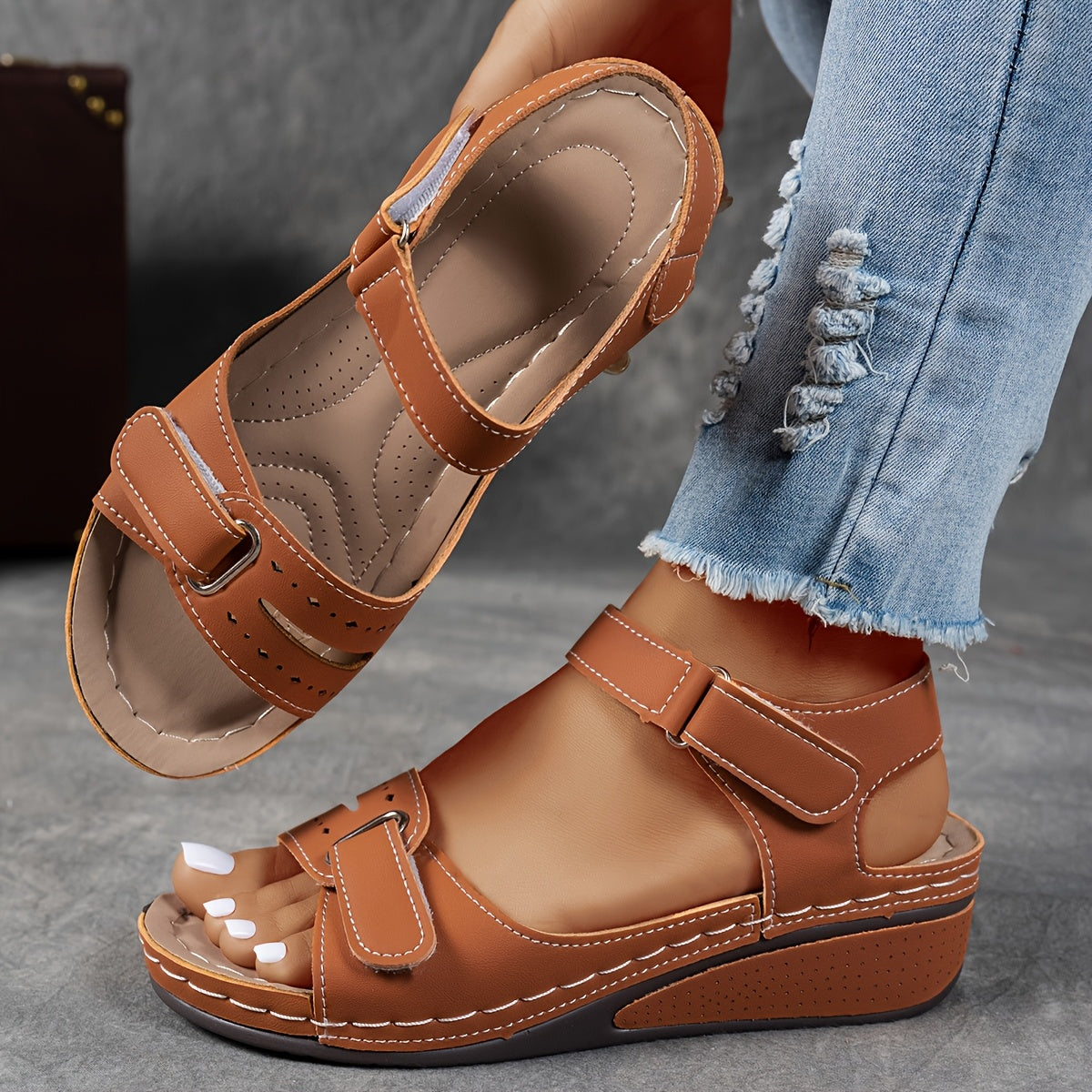 Red women's platform sandals with adjustable straps and ergonomic footbed for all-day comfort