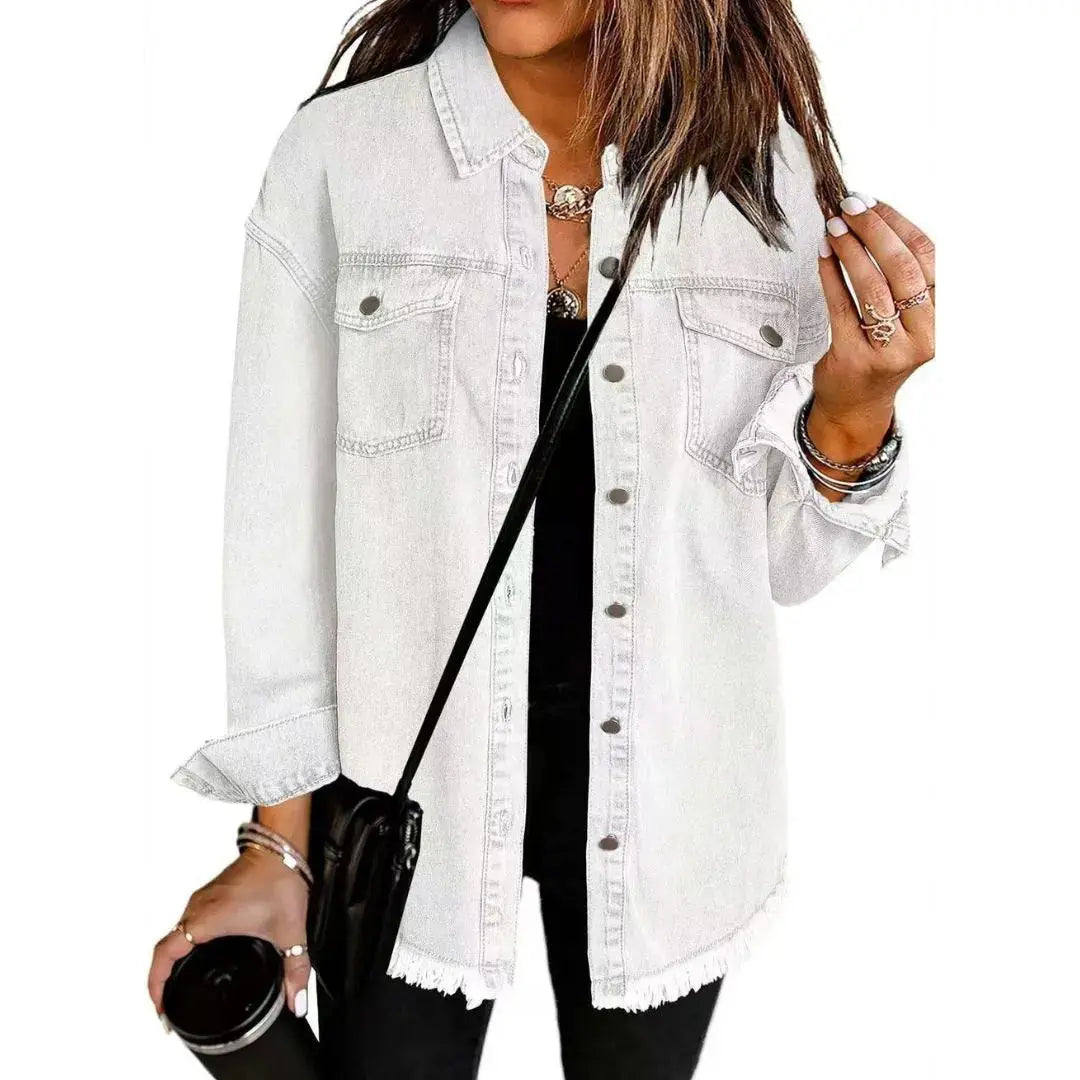 Women's oversized cotton denim shirt jacket in blue relaxed fit with frayed hem and front pockets