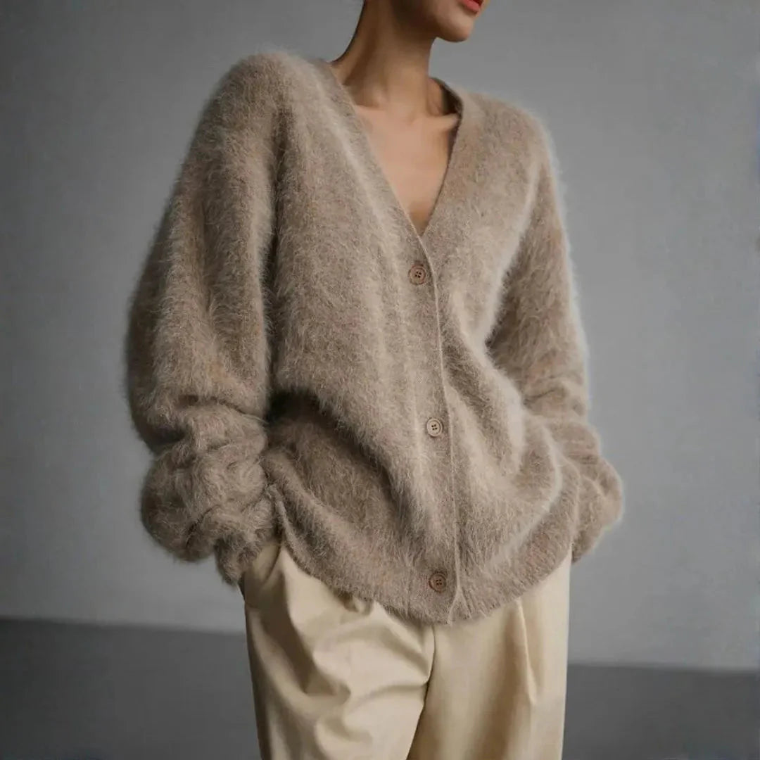 Women's oversized fluffy knit cardigan in neutral tones, cozy relaxed silhouette with plush faux-cashmere texture