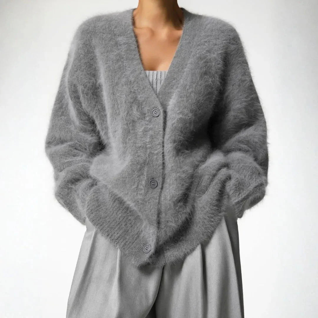 Women's oversized fluffy knit cardigan in neutral tones, cozy cloud-soft plush texture for lounging