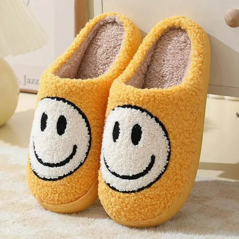 Women's plush sherpa slippers with embroidered smiley face, cozy cushioned lining, anti-slip textured sole