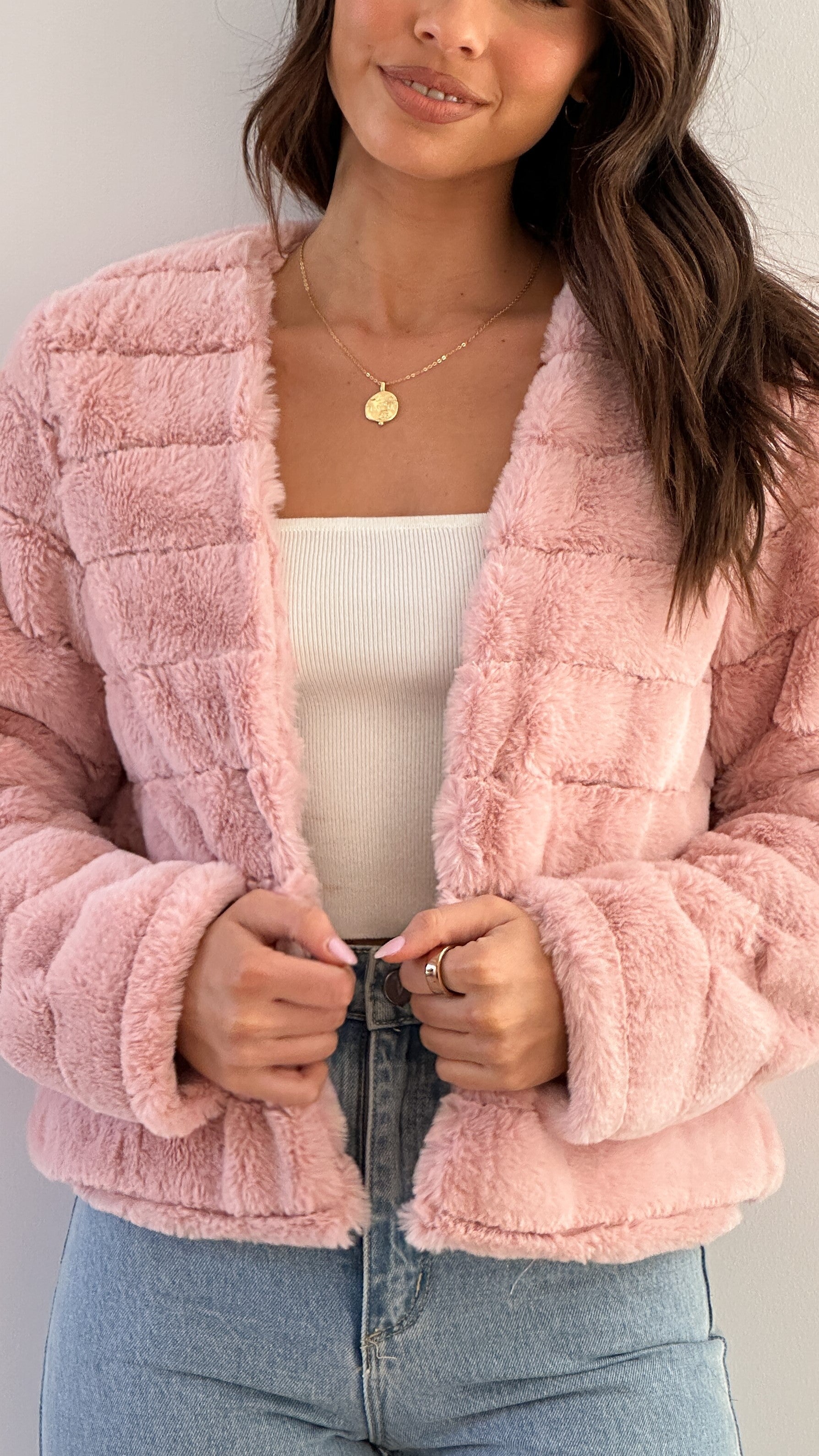 Women's cropped faux fur evening jacket in chic luxury style with plush texture for parties