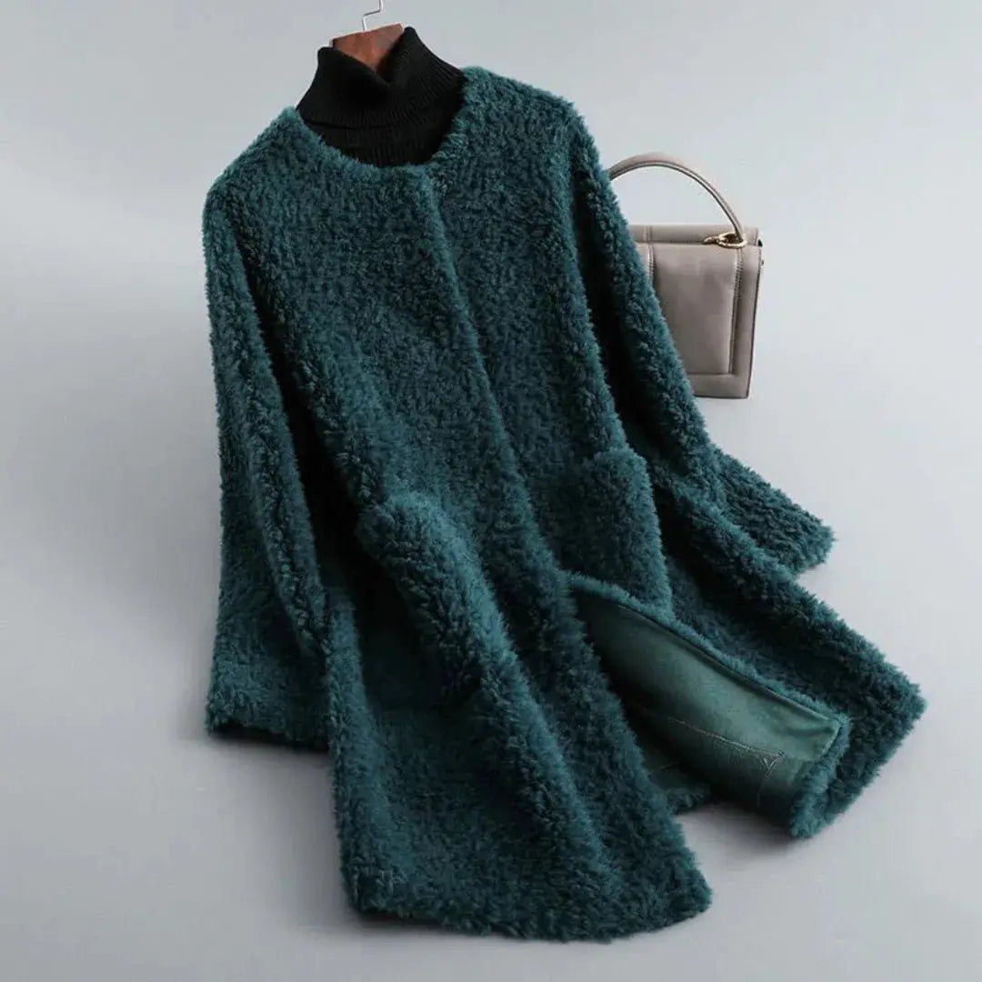 Women's shearling fur coat in plush ultra-soft texture featuring elegant draped design for luxurious warmth