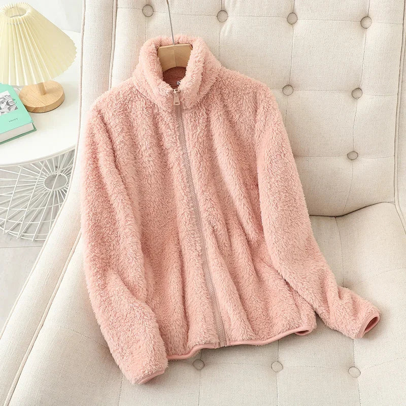 Women's teddy fleece jacket in soft plush texture, relaxed fit with high collar and front zip