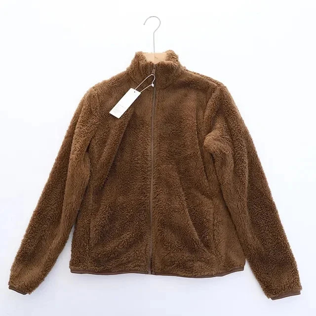 Women's teddy fleece jacket in soft plush texture, relaxed fit with high collar and front zip